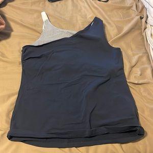 Tank top is navy blue and has a bra inside